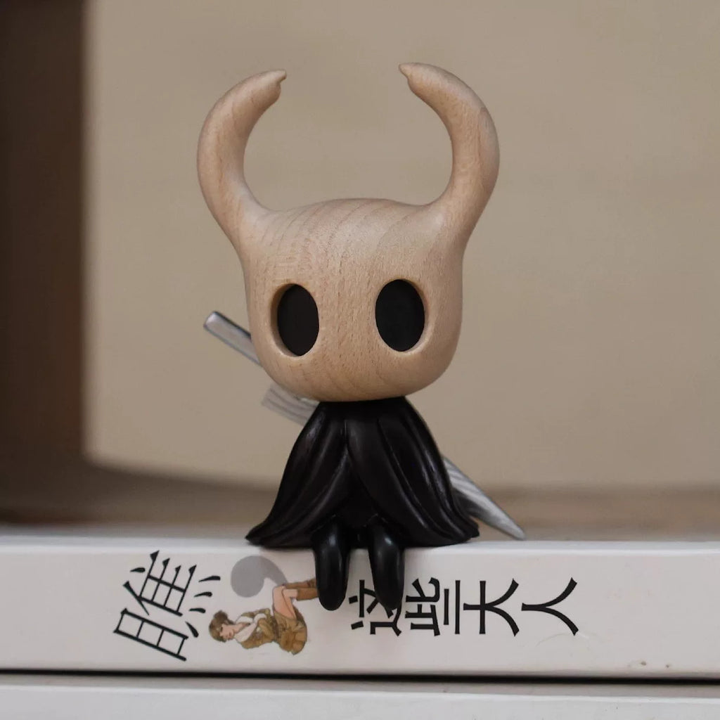 Wooden Knight figure perched on a shelf