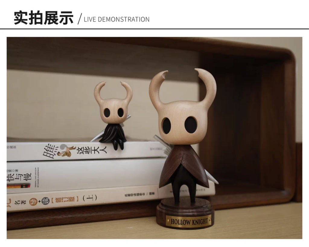 Standing Hollow Knight wooden figure displayed on a shelf with a smaller figure in the background
