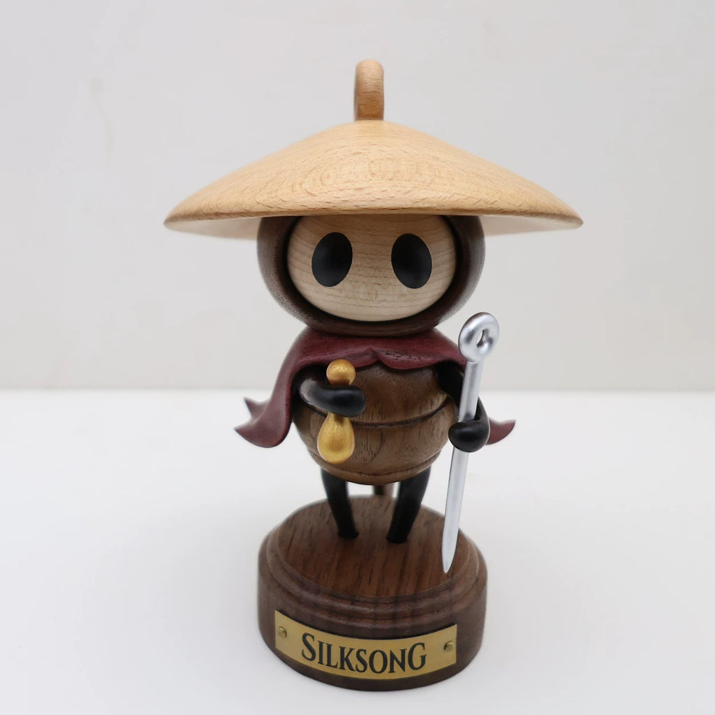 Sherma wooden figure with straw hat and display base