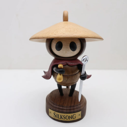 Sherma wooden figure with straw hat and display base